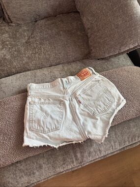 Levi's White Denim Cutoff Shorts with Frayed Hem